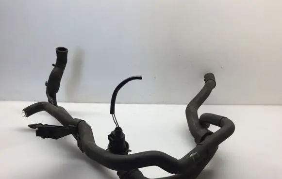 Volkswagen PASSAT B7 Engine coolant pipe/hose K0133687L 8K0973732