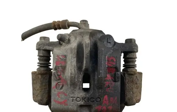 Subaru Legacy Rear brake caliper 123456