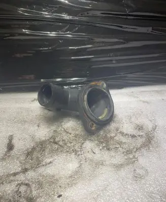 Volkswagen PASSAT B6 Engine coolant pipe/hose 03L121121A 03G121121D