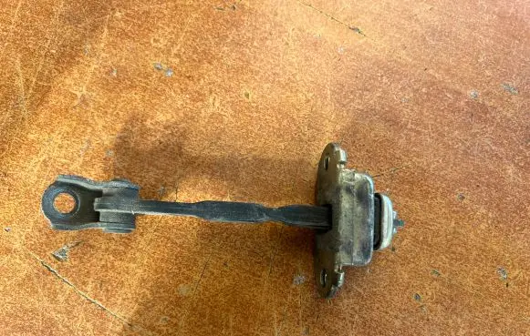 Nissan Almera N16 Rear door check strap stopper
