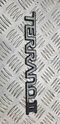 Nissan Terrano Manufacturers badge/model letters 