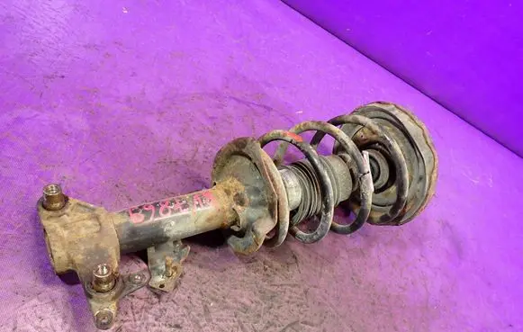 Nissan Primera Front shock absorber with coil spring