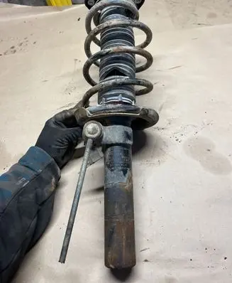 Front shock absorber with coil spring