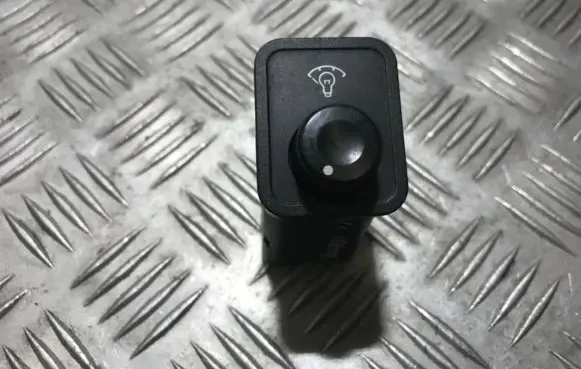 Panel lighting control switch