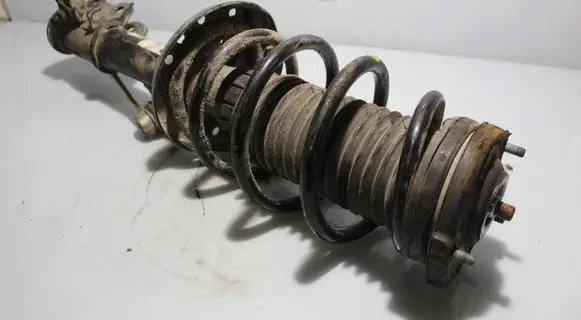 Opel Combo D Front shock absorber with coil spring