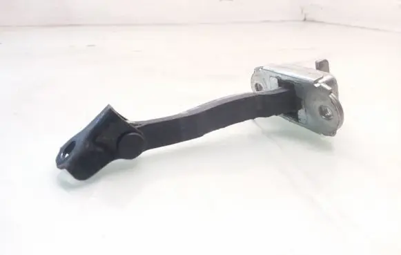 Front door check strap stopper