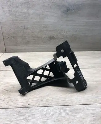 Headlight washer nozzle holder