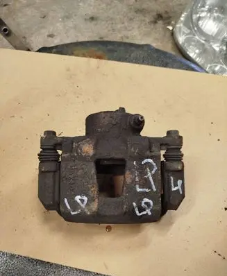 Suzuki Forenza Front brake caliper 