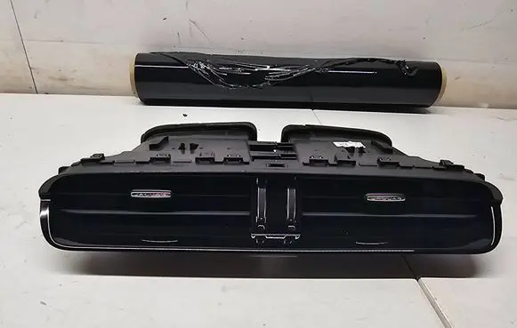 Jaguar XF Dash center air vent grill GX63014L21AB