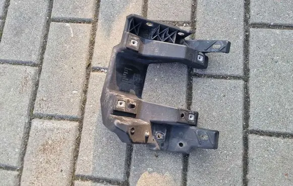 Dodge RAM 1500 DS Headlight/headlamp mounting bracket 68291438AB