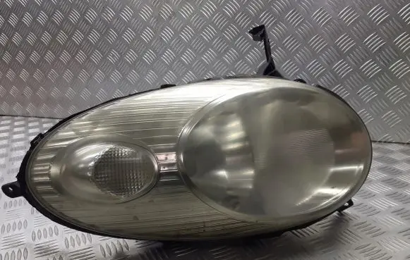 Nissan Micra Headlight/headlamp 08-215-1194L