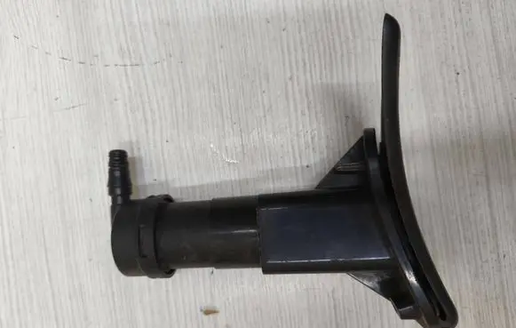Headlight washer spray nozzle cap/cover