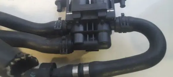 Coolant heater control valve