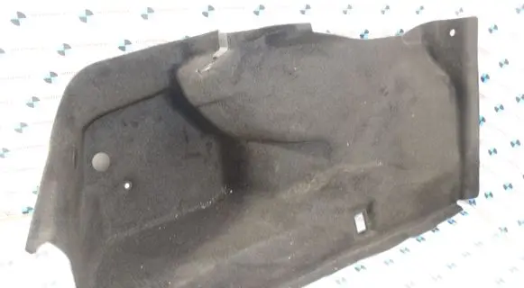 Trunk/boot lower side trim panel