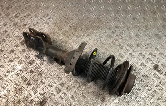 Front shock absorber with coil spring