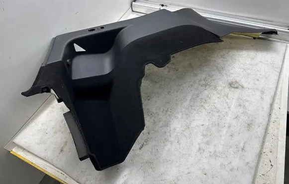 Trunk/boot lower side trim panel