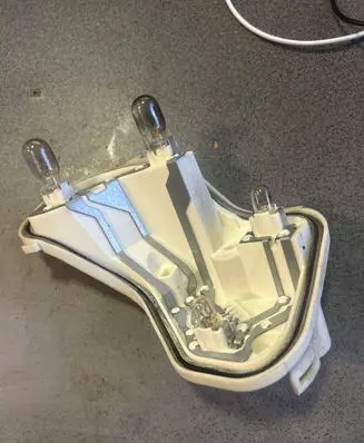 Opel Astra J Tail light bulb cover holder 13306460