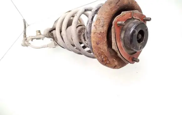 Nissan Primera Front shock absorber with coil spring