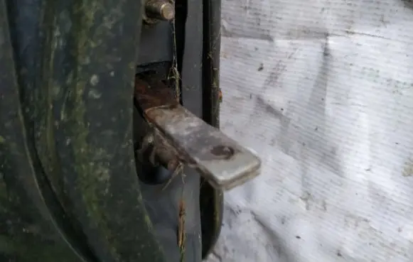 Mazda 323 F Rear door check strap stopper