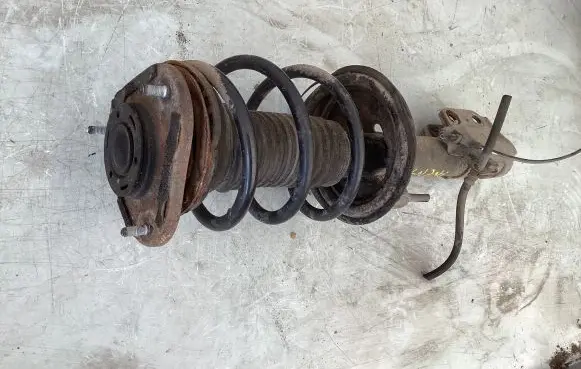 Toyota Avensis T250 Front shock absorber with coil spring