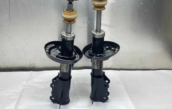 Opel Astra J Front shock absorber/damper 13412596 13412595