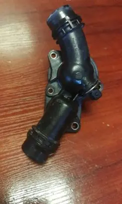 Thermostat/thermostat housing