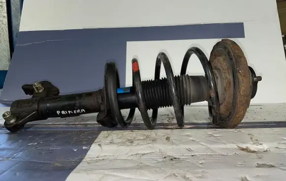 Front shock absorber with coil spring