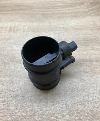 Opel Corsa D Mass air flow meter 13307079