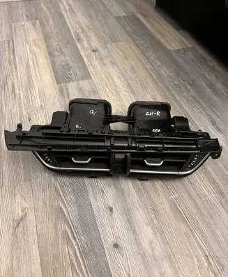 Dash center air vent grill