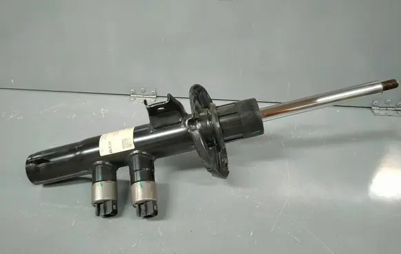Volkswagen PASSAT B9 Front shock absorber/damper 3WA413023F