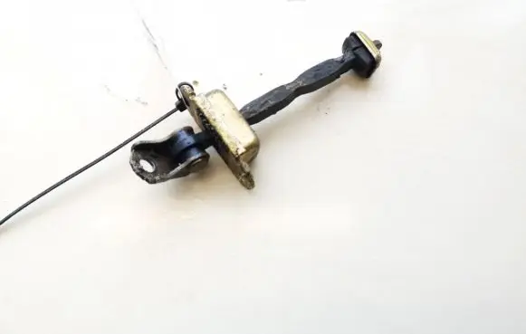 Front door check strap stopper