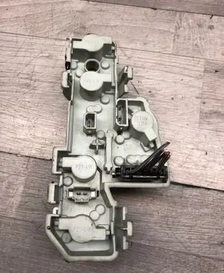 Tail light bulb cover holder