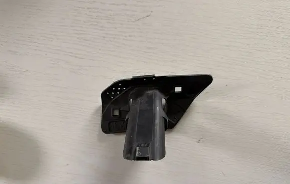 Volkswagen Golf VII Headlight washer nozzle holder 5G0807942A