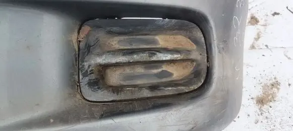 Mazda 323 Front bumper lower grill