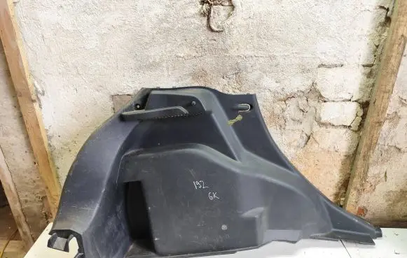 Trunk/boot lower side trim panel
