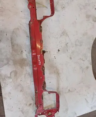 Radiator support slam panel bracket
