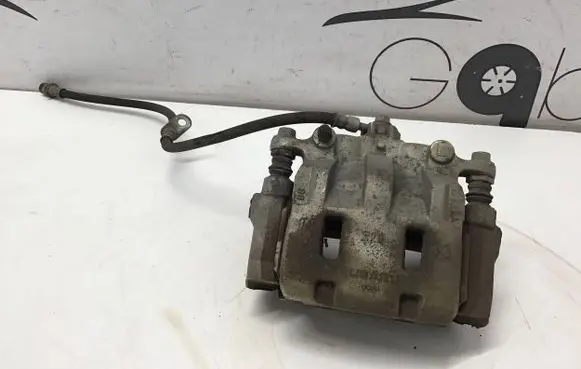 Subaru Outback (BT) Front brake caliper