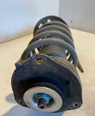 Volkswagen PASSAT B7 Front shock absorber with coil spring