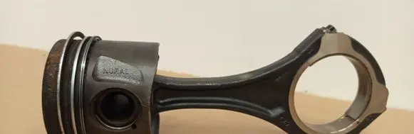 Piston with connecting rod