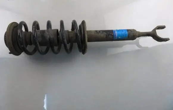 Front shock absorber with coil spring