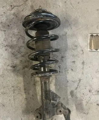 Nissan Primera Front shock absorber with coil spring