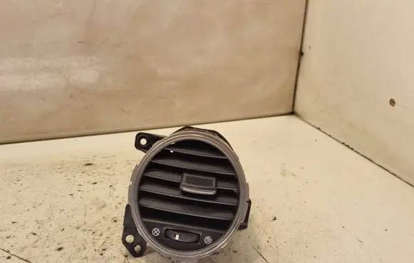 KIA Carens II Dash center air vent grill 974101D000 80464948