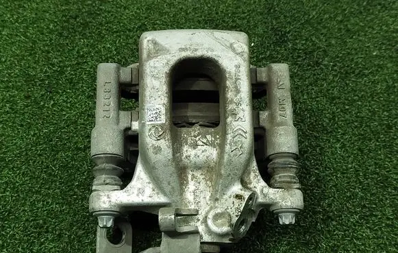 Peugeot 2008 II Rear brake caliper 9824501780 L83202M09