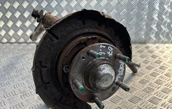 Rear wheel hub spindle/knuckle