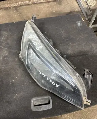 Opel Astra J Headlight/headlamp 1LG01001110