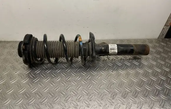 Volkswagen Beetle A5 Front shock absorber with coil spring 5C0413031T