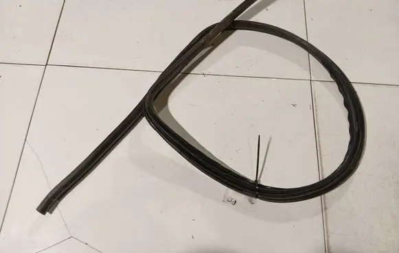 Nissan Micra Rubber seal front coupe door 