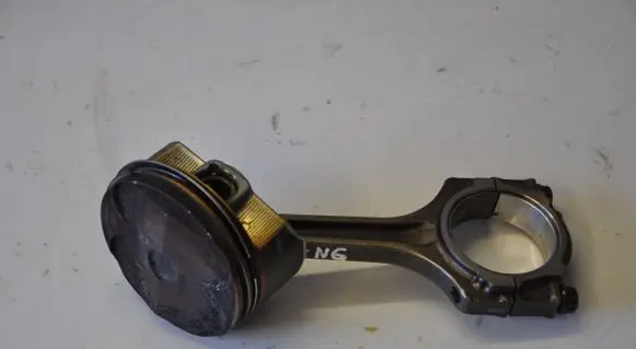 Piston with connecting rod