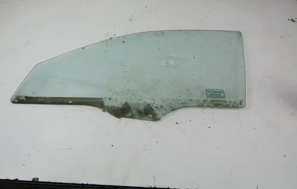 Mazda 626 Front door window glass four-door 