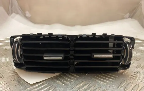 Dash center air vent grill